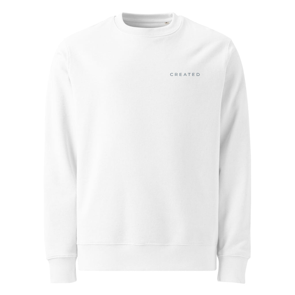 White sweatshirt with 'CREATED' text on a white background.